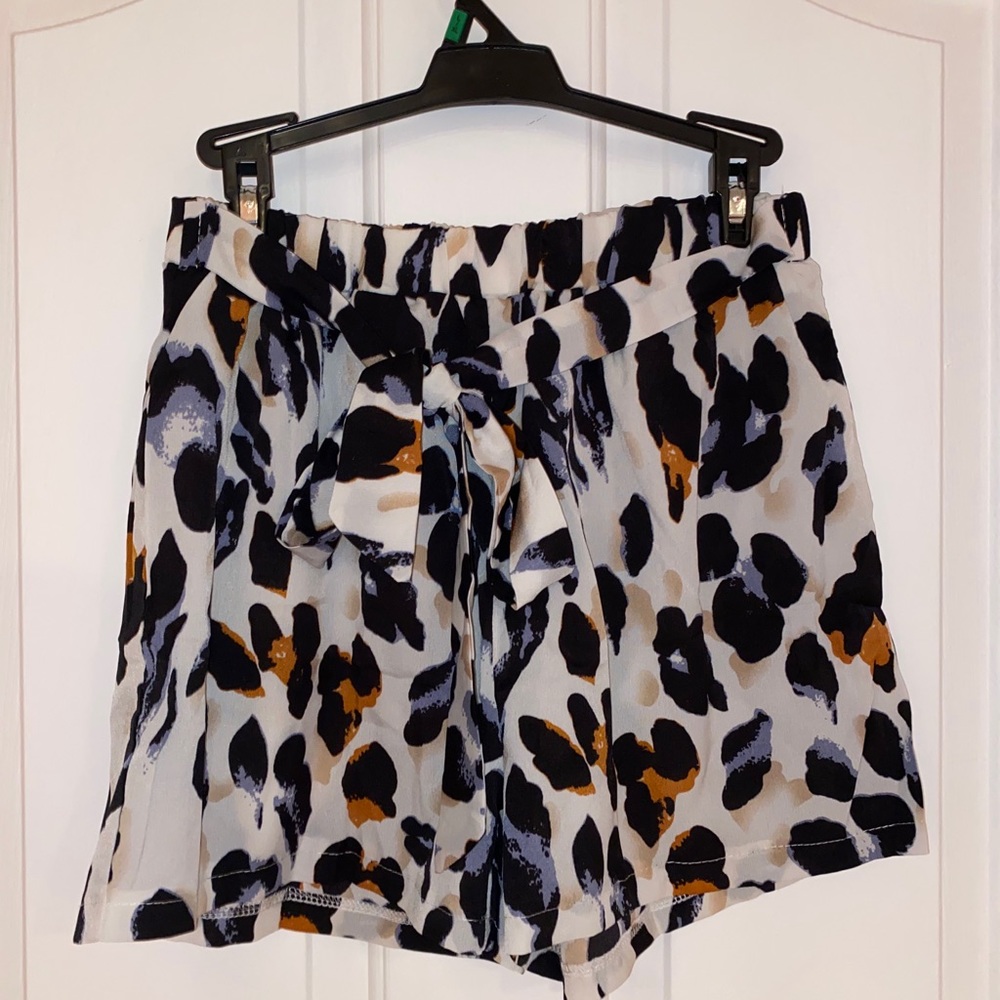 Adorable flowy shorts with tie and elastic waist!